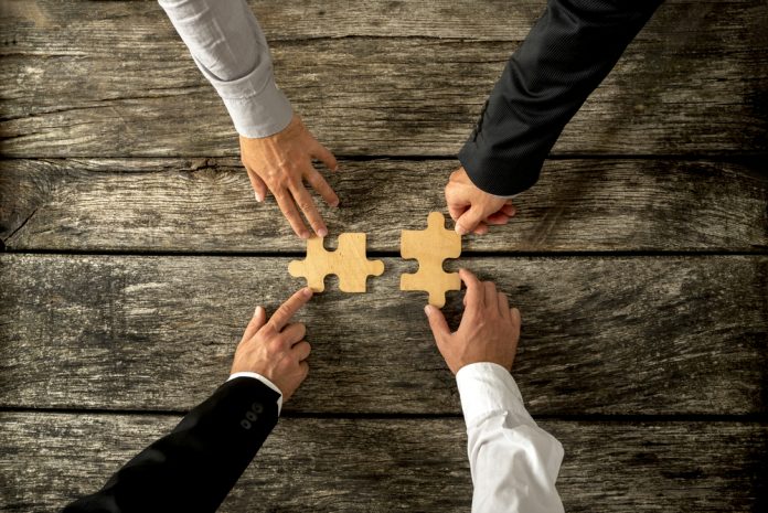merger 2 merger puzzle with four hands