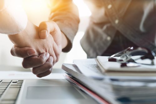 merger merger shaking hands