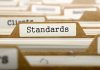 Standards Setting, Standards Development and Division of the Gains from Standardization