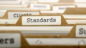 Standards Setting, Standards Development and Division of the Gains from Standardization