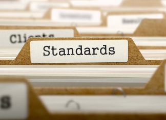 Standards Setting, Standards Development and Division of the Gains from Standardization